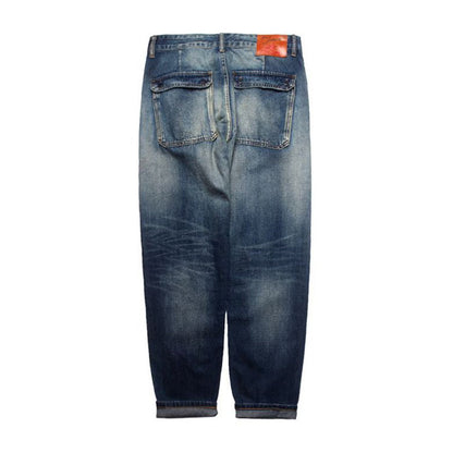 Washed denim pants with flap pockets