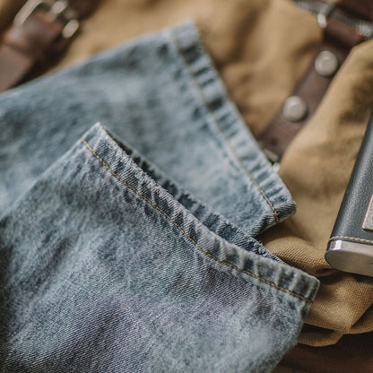 Stone washed light colored denim pants